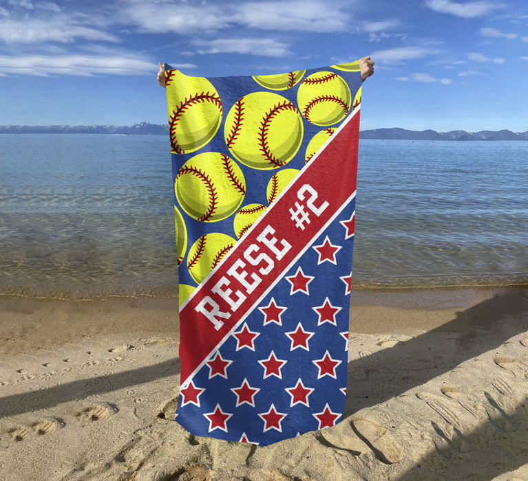 a beach towel with a baseball design on it